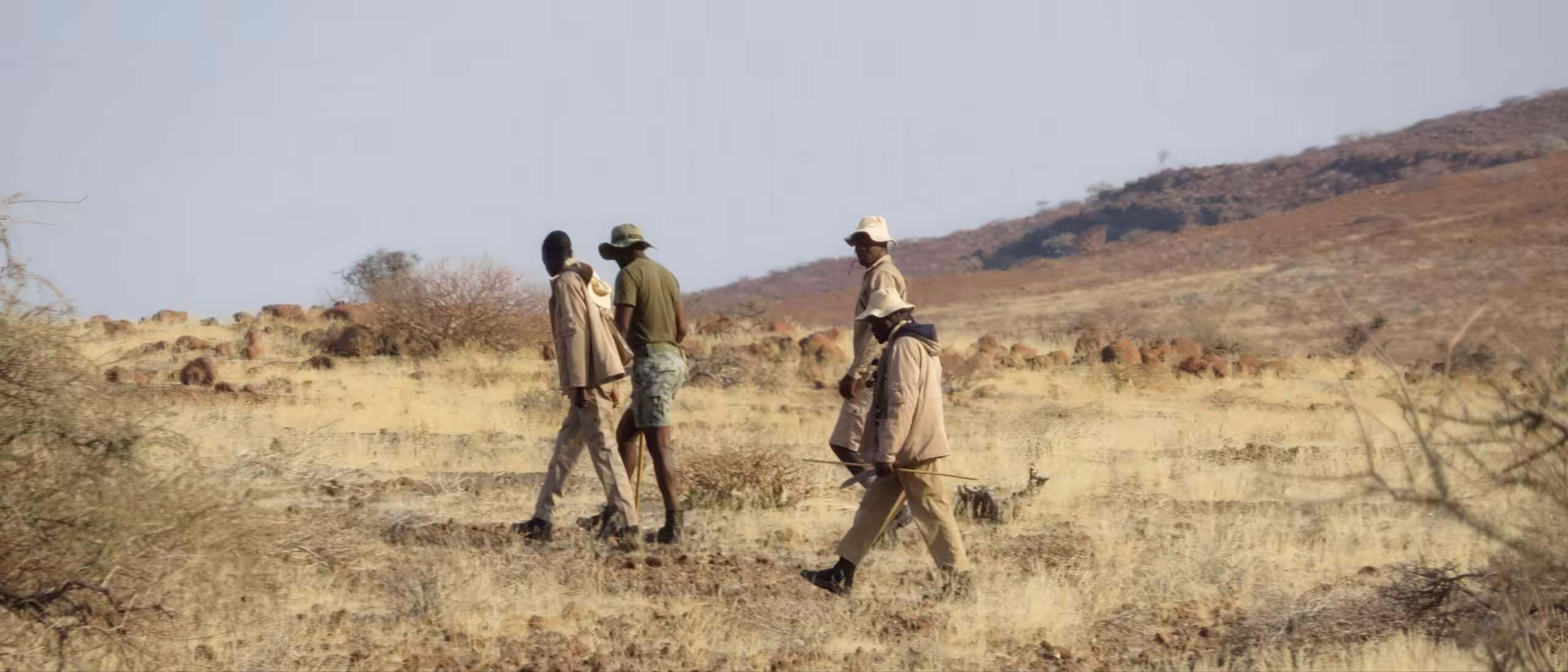A group of four game guards on patrol.